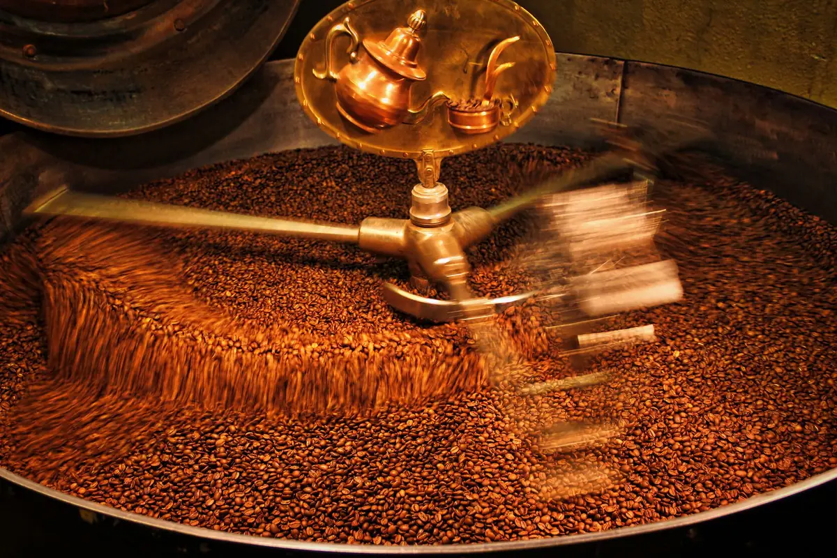 Beans turning in the cooling tray of the roaster