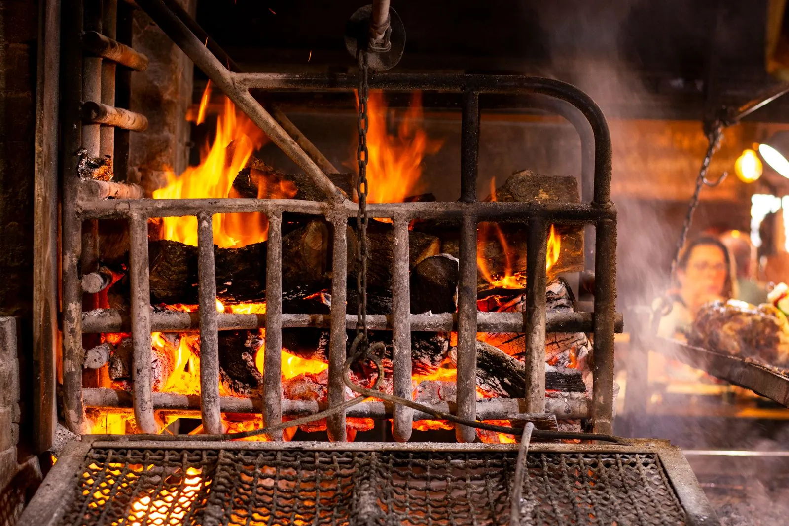 The wood grill in full flame