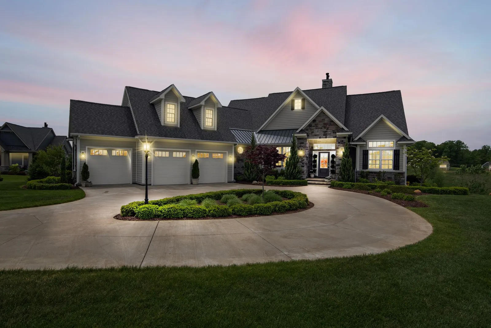 A finished custom home at dusk