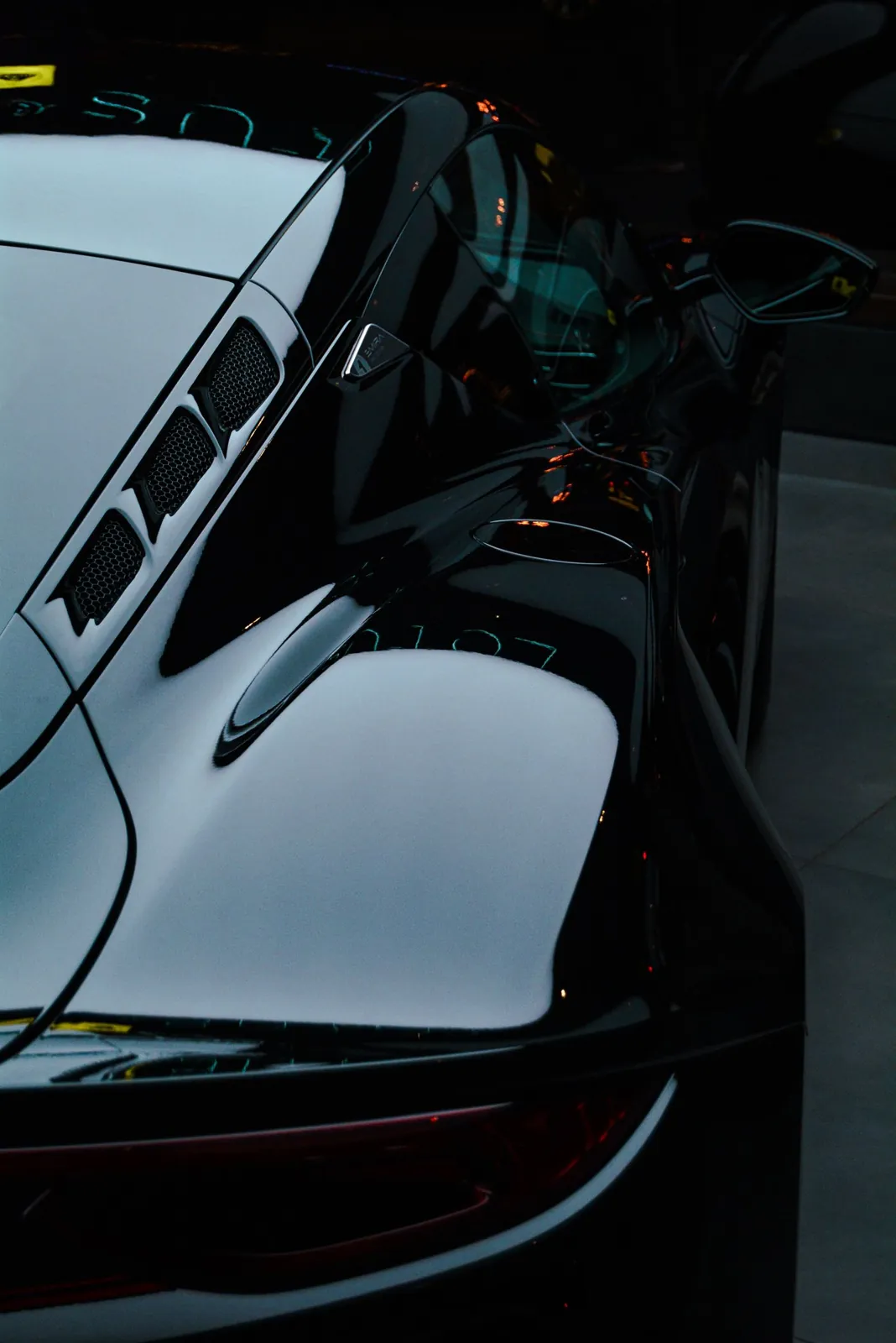 Black paint after a coating, reflecting the lights