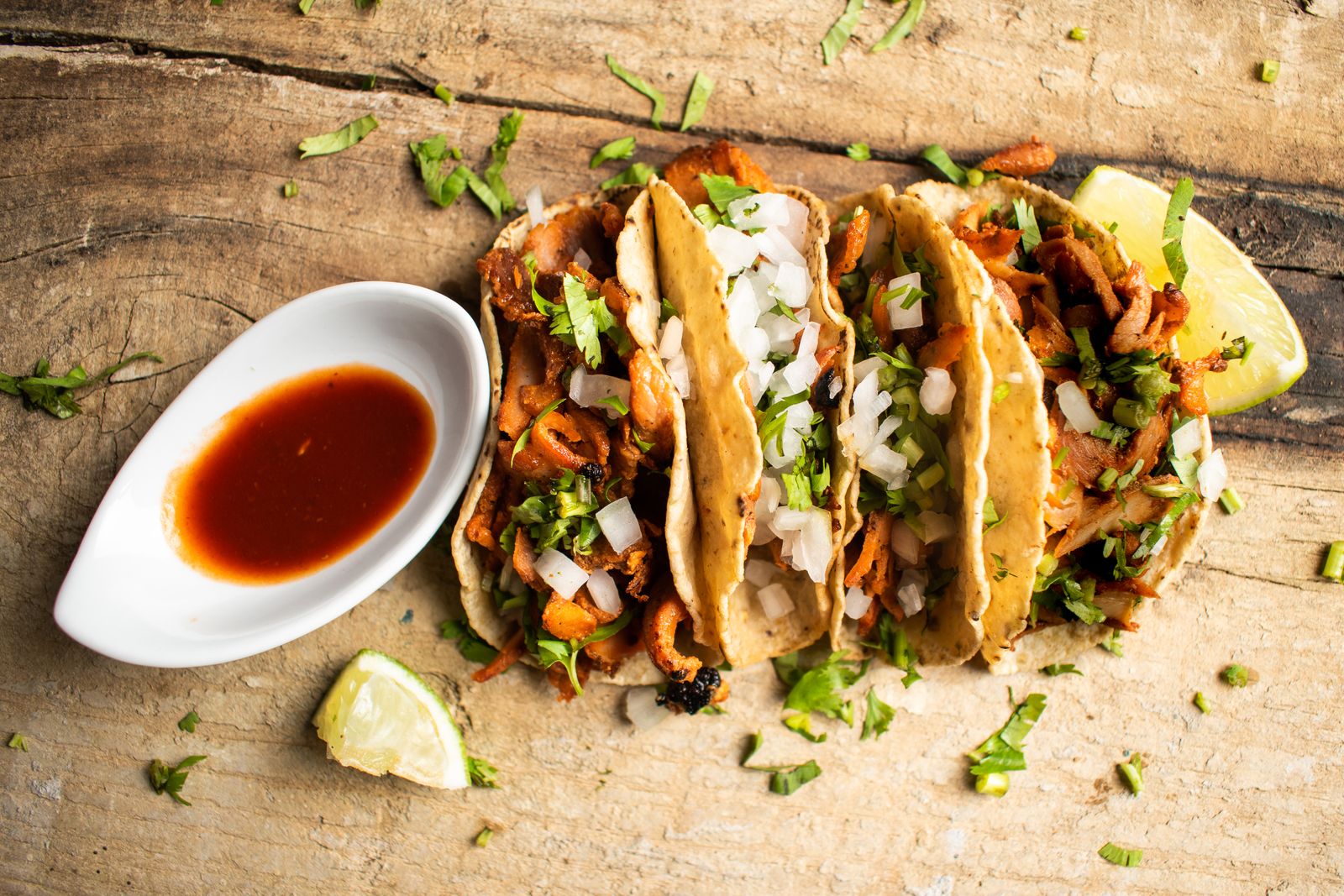 Tacos al pastor with onion and coriander